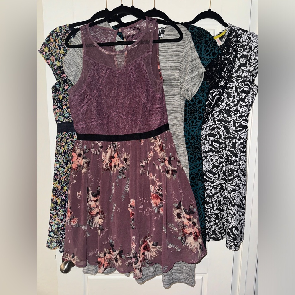 Five babydoll style dresses. Size Large